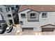 Aerial view of new townhome community highlighting garages and convenient parking at 8436 Noir Ave, Las Vegas, NV 89129