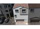 Aerial view of new townhome community highlighting garages and modern construction at 8436 Noir Ave, Las Vegas, NV 89129