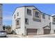 Charming townhome with attached garage, multi-paned windows, and neutral stucco at 8436 Noir Ave, Las Vegas, NV 89129