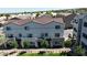 New townhome community with green lawns and convenient parking at 8436 Noir Ave, Las Vegas, NV 89129