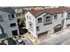Aerial view of new townhome community with garages and modern facade at 8436 Noir Ave, Las Vegas, NV 89129