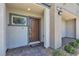 A cozy front porch, featuring a covered entry and attractive brick pavers at 8436 Noir Ave, Las Vegas, NV 89129