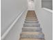 Carpeted stairway leading to the upper level of the home at 8436 Noir Ave, Las Vegas, NV 89129