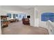 Bright bonus room with many windows for natural light at 8812 Glenistar Gate Ave, Las Vegas, NV 89143