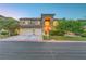 Attractive two-story home features a three-car garage and well-manicured front yard at 8812 Glenistar Gate Ave, Las Vegas, NV 89143