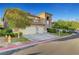 Charming two-story home features a three-car garage, desert landscaping, and inviting curb appeal at 8812 Glenistar Gate Ave, Las Vegas, NV 89143