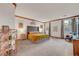 Large main bedroom with a neutral color scheme and natural light at 8812 Glenistar Gate Ave, Las Vegas, NV 89143