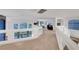 Upstairs hallway provides a view of the living room below at 8812 Glenistar Gate Ave, Las Vegas, NV 89143