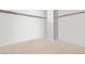 Walk-in closet featuring carpet and ample storage space at 9004 Harbor Wind Ave, Las Vegas, NV 89178
