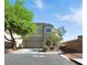 Charming two-story home with a well-maintained front yard and attached two car garage at 9004 Harbor Wind Ave, Las Vegas, NV 89178