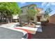 Two-story home with a well-manicured front yard, a covered entryway and an attached two-car garage at 9004 Harbor Wind Ave, Las Vegas, NV 89178