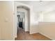 Upstairs hallway featuring neutral walls and carpet, leading to other rooms at 9004 Harbor Wind Ave, Las Vegas, NV 89178
