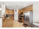 Well-equipped kitchen with stainless steel appliances, tile backsplash, and ample cabinet space at 9004 Harbor Wind Ave, Las Vegas, NV 89178