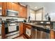 Gourmet kitchen features stainless steel appliances, granite countertops and plenty of storage space at 9112 Picturesque Ave, Las Vegas, NV 89149