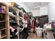 Walk-in closet with shelves and hanging rods at 9112 Picturesque Ave, Las Vegas, NV 89149