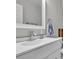 Bathroom featuring a white vanity, mirror, towel and neutral wall color at 918 Ambusher St, Henderson, NV 89014