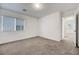 Bedroom with carpet, a window and a doorway to another room at 10325 Quartz Reef Ct, Las Vegas, NV 89141