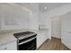 Modern kitchen features granite countertops, stainless steel appliances and an adjacent pantry for added convenience at 10325 Quartz Reef Ct, Las Vegas, NV 89141