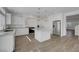 Charming kitchen with stainless steel appliances, granite countertops, and a convenient kitchen island at 10325 Quartz Reef Ct, Las Vegas, NV 89141
