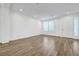 Bright living room boasts tile flooring and lots of natural light at 10325 Quartz Reef Ct, Las Vegas, NV 89141