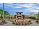 The clubhouse exterior features a well-manicured landscape and inviting entrance for community gatherings at 10623 Kearney Mountain Ave, Las Vegas, NV 89166