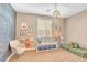 Bright and inviting playroom featuring playful decor, comfortable seating, and ample space for creativity at 10623 Kearney Mountain Ave, Las Vegas, NV 89166