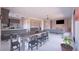 Spacious living room and kitchen with modern countertops, recessed lighting, and contemporary finishes at 1860 Old West Ave, Pahrump, NV 89048