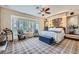 Spacious main bedroom featuring a bay window, accent lighting, and luxurious finishes at 1897 Holdenville St, Henderson, NV 89052