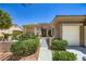 Charming single story home featuring a three-car garage, gated front yard and desert landscaping at 2016 Biloxi Pass, Henderson, NV 89052