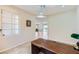 Well-lit office offers tile floors and connects to the living spaces at 2016 Biloxi Pass, Henderson, NV 89052