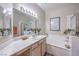 Bathroom featuring a bathtub, shower, and vanity with a sink and a large mirror at 2050 W Warm Springs Rd # 1923, Henderson, NV 89014