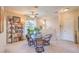 Bright dining room with a glass table and stylish seating at 2050 W Warm Springs Rd # 1923, Henderson, NV 89014