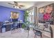 Home office featuring dual desk, an elephant painting and a large window at 2050 W Warm Springs Rd # 1923, Henderson, NV 89014