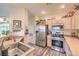 Spacious kitchen featuring stainless steel appliances, tile backsplash, and durable countertops at 2050 W Warm Springs Rd # 1923, Henderson, NV 89014