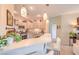 Well-lit kitchen featuring stylish pendant lighting, stainless steel appliances, and a breakfast bar with seating at 2050 W Warm Springs Rd # 1923, Henderson, NV 89014
