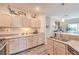 Inviting kitchen with ample cabinet space, granite countertops, and modern stainless steel appliances at 2050 W Warm Springs Rd # 1923, Henderson, NV 89014