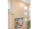Staircase featuring artwork and small windows offering natural light to the stairway at 2050 W Warm Springs Rd # 1923, Henderson, NV 89014