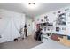 Bright bedroom features ample closet space, white walls, and cozy carpet flooring at 210 Red Sandstone Ave, North Las Vegas, NV 89031