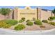 Hawthorne community entrance sign with stone accents surrounded by lush, manicured landscaping and greenery at 210 Red Sandstone Ave, North Las Vegas, NV 89031