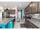 Modern kitchen with stainless steel appliances, granite countertops, and plenty of cabinet space at 210 Red Sandstone Ave, North Las Vegas, NV 89031