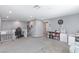 Open loft space with a desk, bookshelf, and carpet, ideal for a home office or entertainment area at 210 Red Sandstone Ave, North Las Vegas, NV 89031