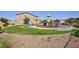 Community playground features a grassy area, picnic tables, benches, and a play structure for outdoor fun at 210 Red Sandstone Ave, North Las Vegas, NV 89031