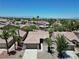 Aerial view of single-story home in an established neighborhood with lush landscaping at 2118 High Mesa Dr, Henderson, NV 89012