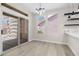 Dining area with sliding glass doors leading to a patio and modern lighting at 2118 High Mesa Dr, Henderson, NV 89012