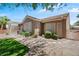 The house features well-maintained desert landscaping, a covered patio, and privacy at 2118 High Mesa Dr, Henderson, NV 89012