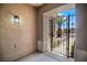 Inviting front porch with decorative security gate and textured walls at 2118 High Mesa Dr, Henderson, NV 89012