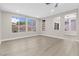 Bright living area showcasing modern flooring, neutral walls, and large windows with backyard views at 2118 High Mesa Dr, Henderson, NV 89012