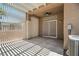 This covered patio includes a ceiling fan and provides ample space for outdoor entertaining at 2118 High Mesa Dr, Henderson, NV 89012
