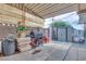 Covered patio is an outdoor utility space with grill, storage, and shelving at 224 Catalini St, Las Vegas, NV 89107