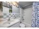 Bathroom featuring a vanity, toilet, and shower-tub combination with unique fish shower curtain at 224 Catalini St, Las Vegas, NV 89107